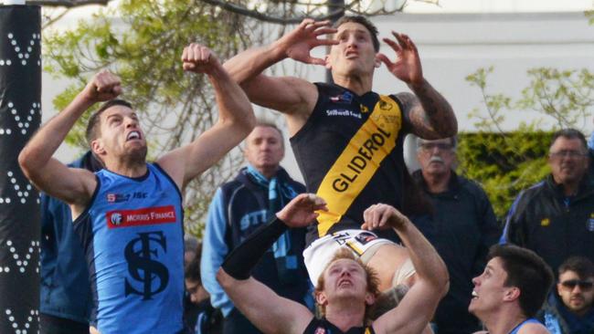 Jesse White flies for a screamer in the 2019 season, during his time with SANFL club Glenelg. Picture: Brenton Edwards)