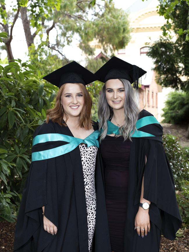 Amy Schmidt and Ashlea Hull at the UTAS Graduation at Launceston. PICTURE CHRIS KIDD