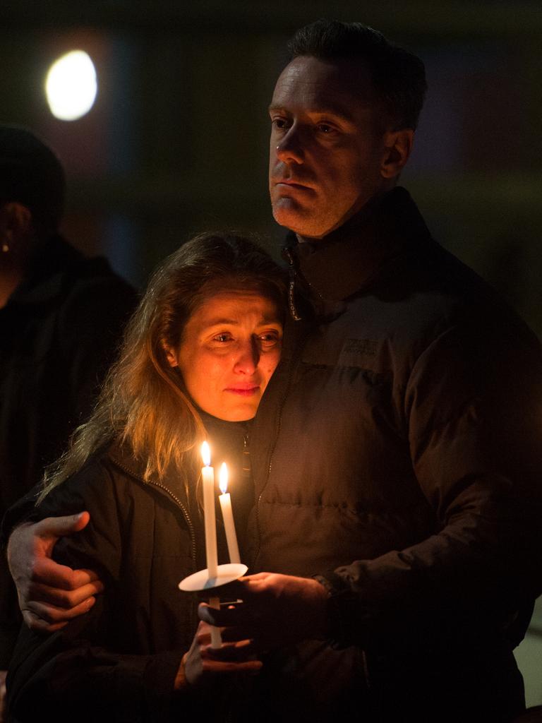 Mourners at a candlelight vigil and service for slain sex worker Tracy Connelly held in St Kilda.