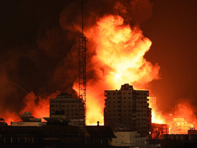 A fireball erupts during Israeli bombardment of Gaza City on October 9. Picture: Mahmud Hams/AFP