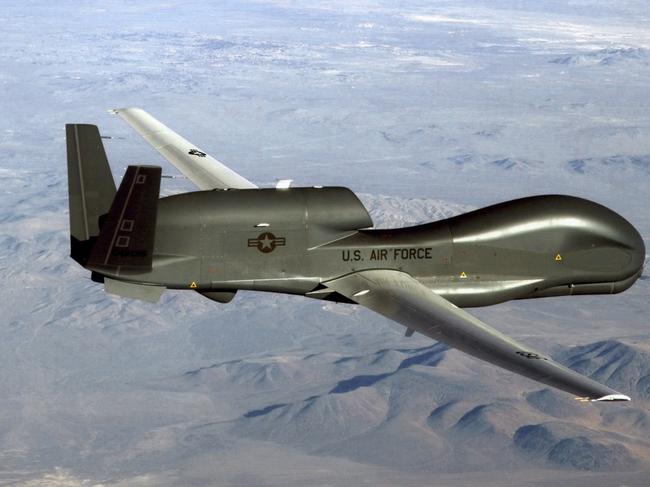 TOPSHOT - This undated US Air Force file photo released on June 20, 2019 shows a photo of a RQ-4 Global Hawk unmanned surveillance and reconnaissance aircraft. - A US spy drone was some 34 kilometers (21 miles) from the nearest point in Iran when it was shot down over the Strait of Hormuz by an Iranian surface-to-air missile June 20, 2019, a US general said. "This dangerous and escalatory attack was irresponsible and occurred in the vicinity of established air corridors between Dubai, UAE, and Oman, possibly endangering innocent civilians," said Lieutenant General Joseph Guastella, who commands US air forces in the region."At the time of the intercept the RQ-4 was at high altitude, approximately 34 kilometers from the nearest point of land on the Iranian coast," he said, over a video to the Pentagon press briefing room. (Photo by Handout / US AIR FORCE / AFP) / RESTRICTED TO EDITORIAL USE - MANDATORY CREDIT "AFP PHOTO / US AIR FORCE/HANDOUT" - NO MARKETING - NO ADVERTISING CAMPAIGNS - DISTRIBUTED AS A SERVICE TO CLIENTS