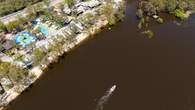 Water has risen to the levee built at Big 4 Holiday Park in Renmark, Saturday, Dec 3, 2022. (The Advertiser/ Morgan Sette)