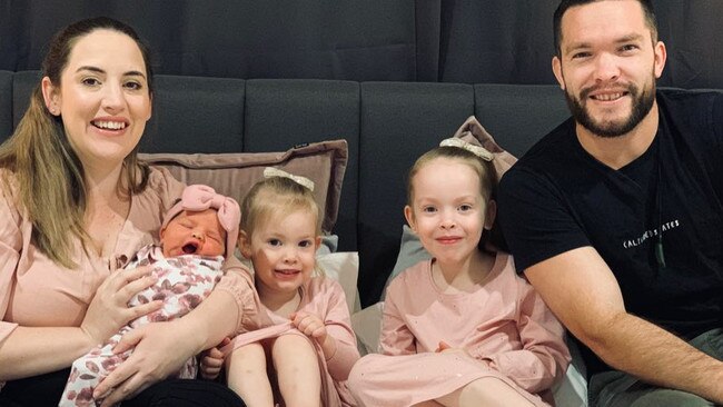 Chloe Aitken, pictured here with husband Sam and their three daughters, says Springfield is in desperate need of its own public hospital. Picture: Supplied