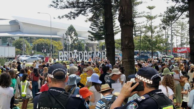 Queensland Police officers watching over the Global Climate Strike at Broadbeach on Friday. Picture: Luke Mortimer