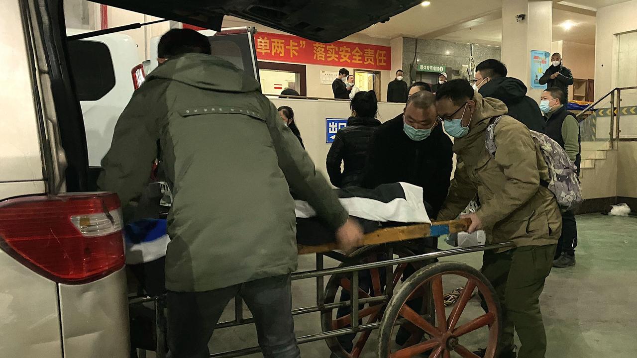 A body is taken to a crematorium in Chongqing. Picture: Noel Celis/AFP