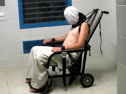 Child hooded, strapped to mechanical restraint chair in NT detention. Source: ABC NEWS