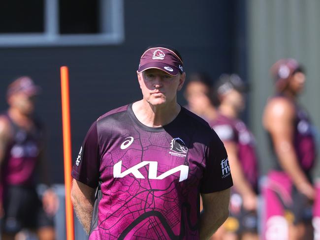 Michael Maguire put his players through their paces on day one of the Broncos pre-season, but it was all done by the book. Picture: Nigel Hallett