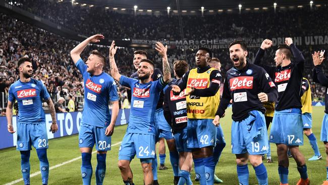 Napoli's teamplayers celebrate after winning the end of the Italian Serie A football match between Juventus and Napoli