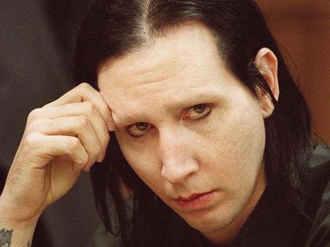 USA singer Brian Warner also known as Marilyn Manson sitting for his preliminary examination in the 52nd District Court in Clarkston, Michigan where he is facing charges of indecency 28 Dec 2001.