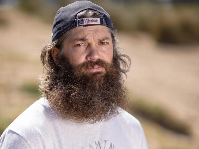 Max Rooke a former Geelong footballer is the lead plaintiff of a class action lodged against the AFL for life altering injuries as a result of concussion. Pictured with his dog Boy. Picture: Jason Edwards