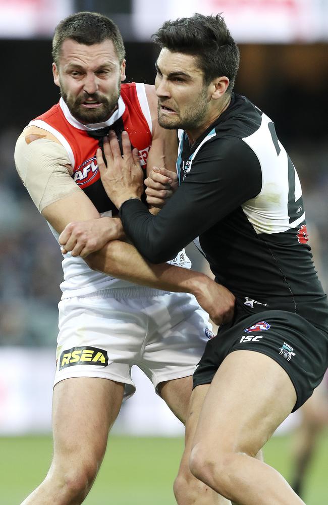 Port Adelaide’s Chad Wingard battles St Kida skipper Jarryn Geary. Picture Sarah Reed