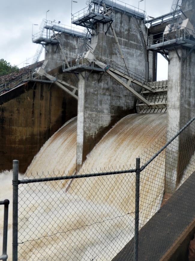 Ross River Dam opened its floodgates as the heavy rain continues to hit Townsville. Picture: Alix Sweeney