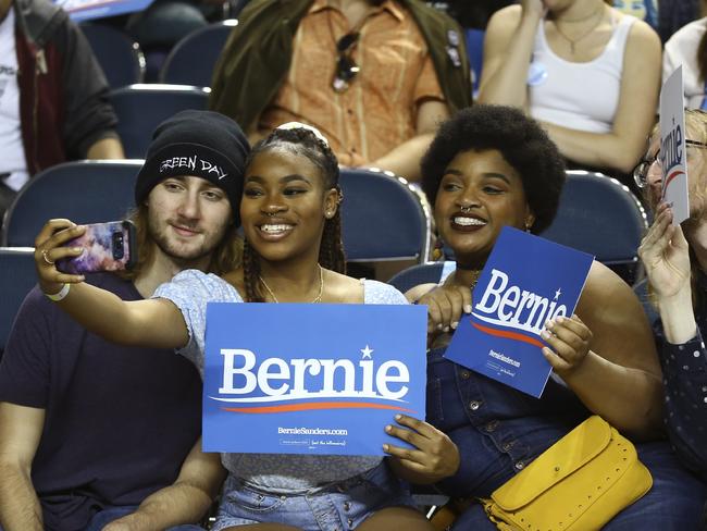 Supporters of Democratic presidential candidate Sen. Bernie Sanders take a selfie. Picture: AP