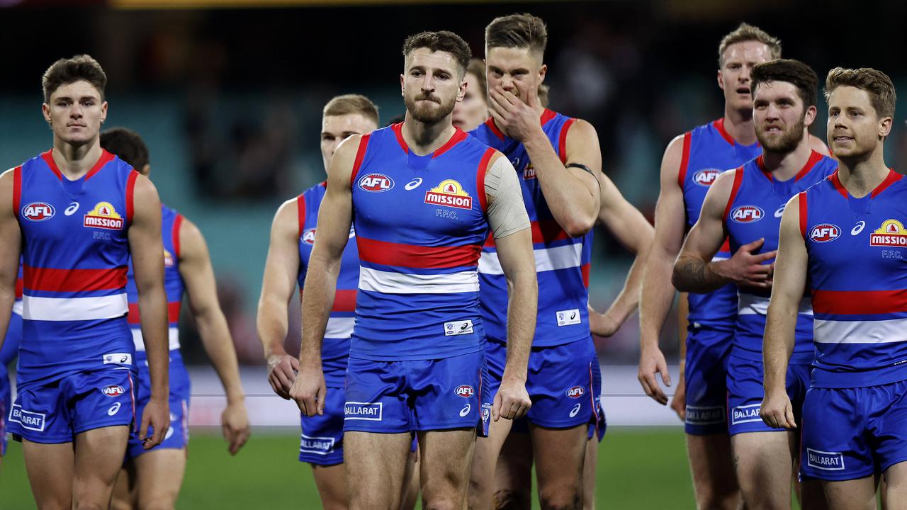Bulldogs players appeared dejected as they leave the SCG. Picture: Phil Hillyard