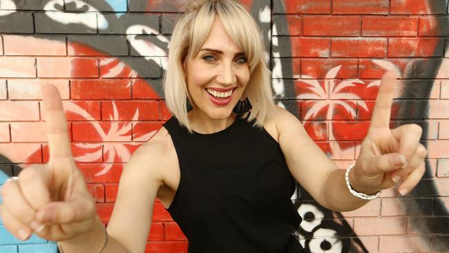 Hot Tomato Radio Station announcer Emily Jade O'Keeffe celebrates the station’s Gold Coast ratings win. Picture: Glenn Hampson