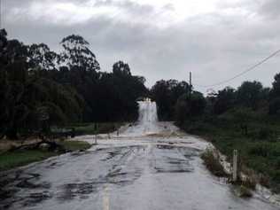 Floodwater cut the intersection of South and McDougall Streets. . Picture: Contributed