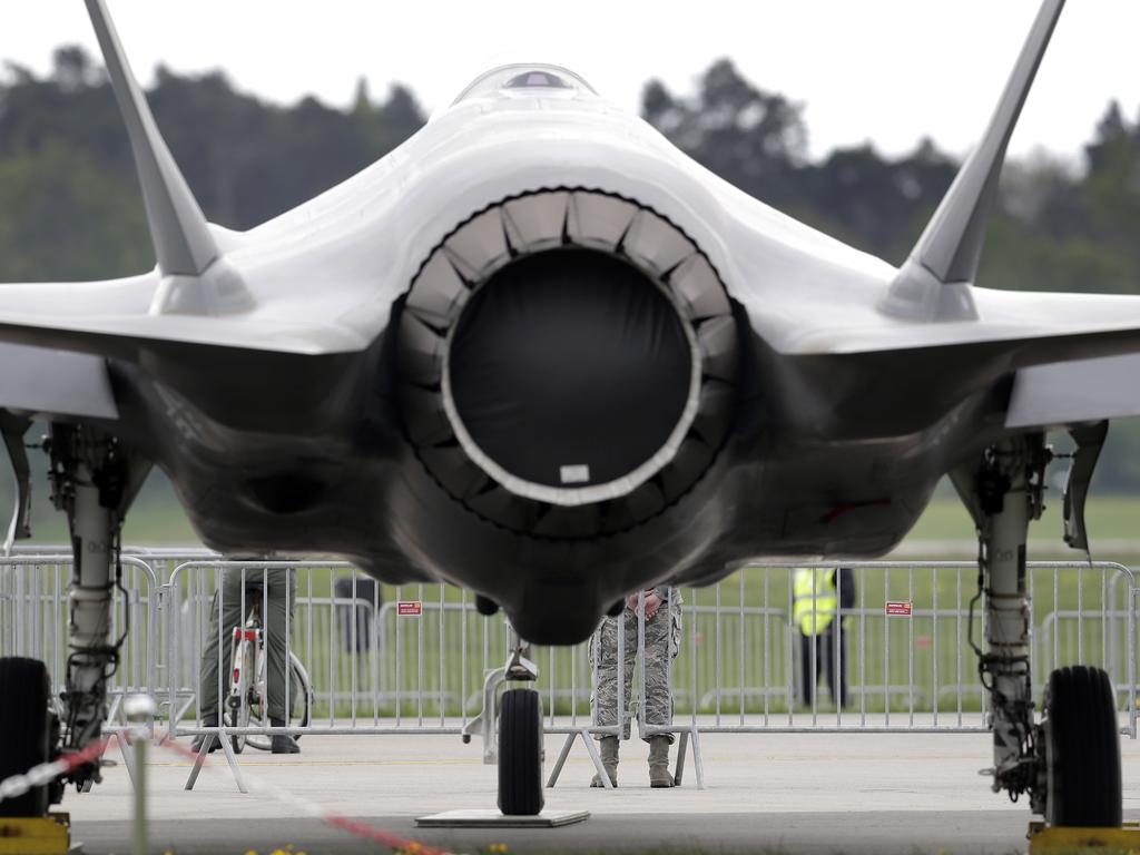 People look at a Lockheed F-35 aeroplane during the ILA Berlin Air Show in Berlin, Germany. Picture: AP