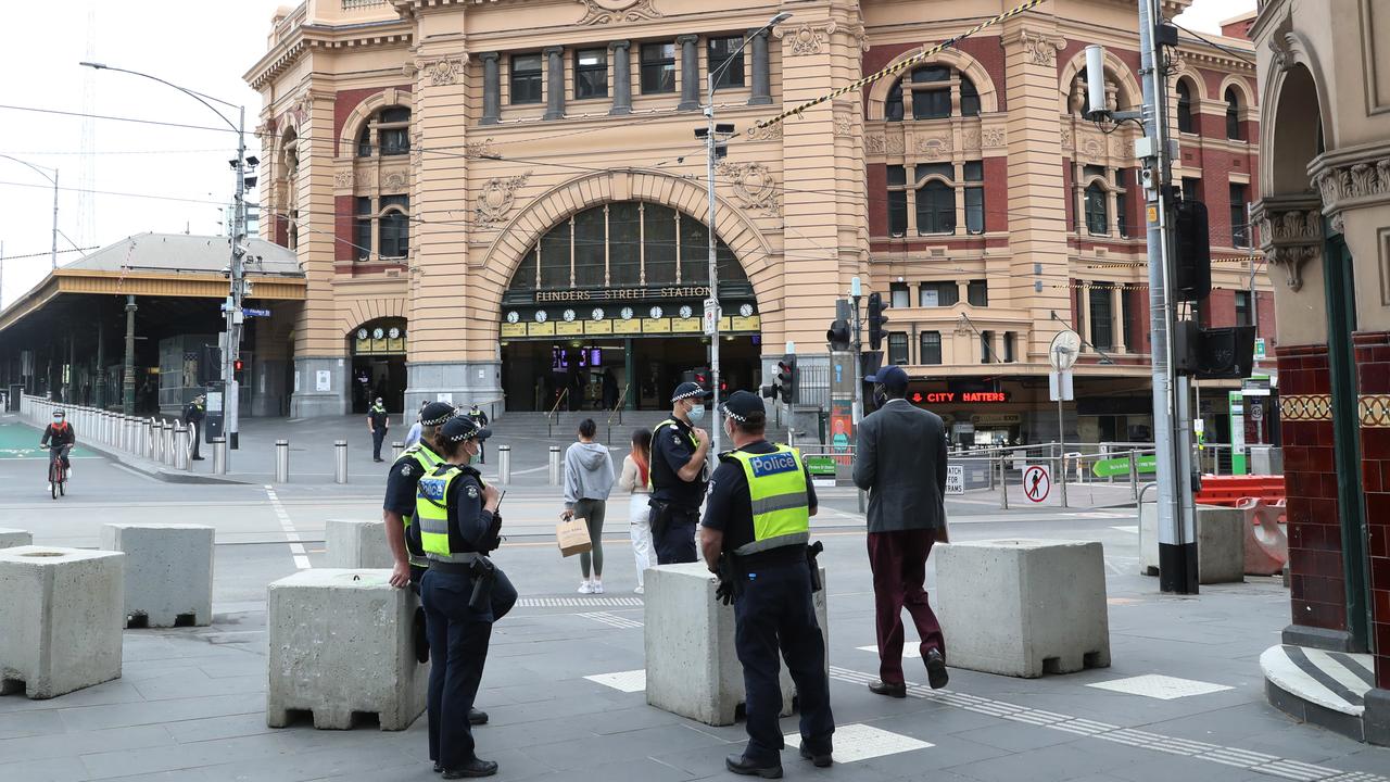 Police patrol quiet Melbourne streets on grand final eve. Picture: David Crosling