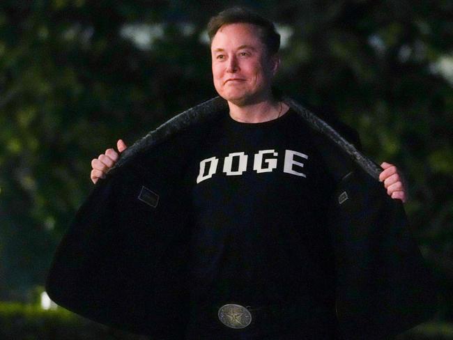 (FILES) Elon Musk shows off a shirt that says 