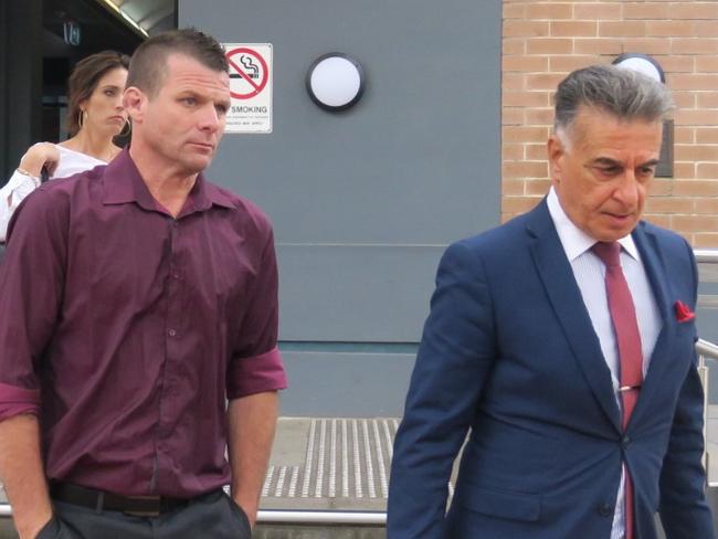 Damian Seaman (left) leaving Wyong Local Court with his solicitor Manny Conditsis after further driving offences were laid. Picture: Richard Noone