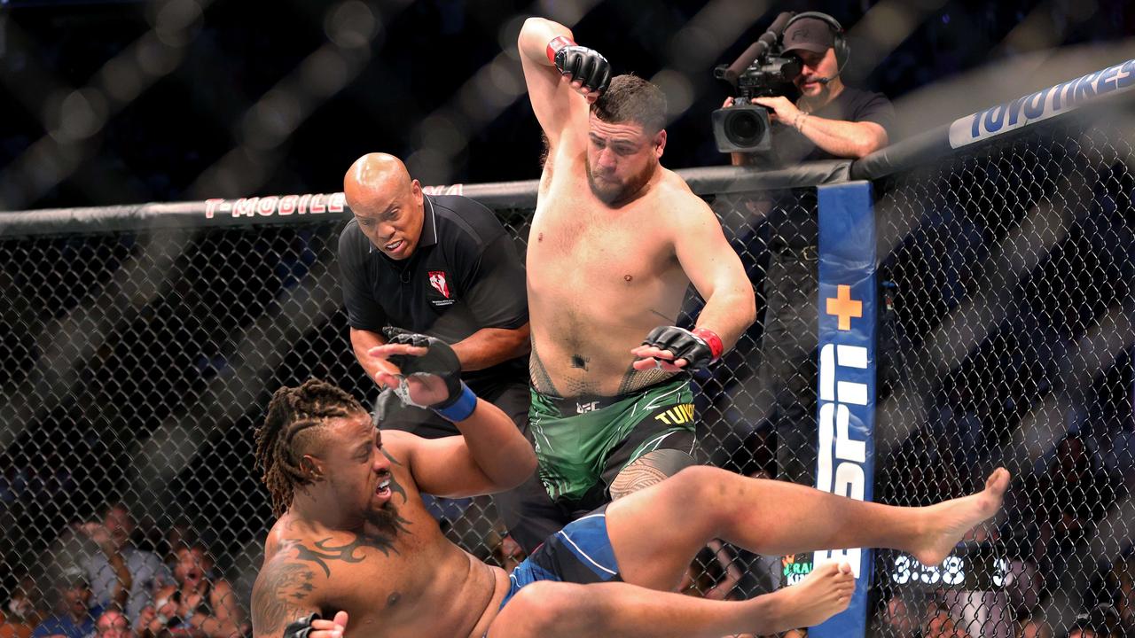 Tai Tuivasa finishes Greg Hardy at UFC 264. Stacy Revere/Getty Images/AFP