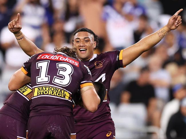 Keenan Palasia, Patrick Carrigan and Payne Haas celebrate victory. Picture: Mark Kolbe/Getty Images