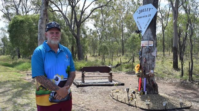 Joels Weeks' dad Matthew Weeks at the memorial at the site of the crash along Lake Callide Dr at Valentine Plains. Picture: Aden Stokes