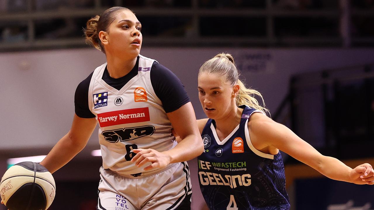 Shaneice Swain of the Flames handles the ball against Jazmin Shelley of Geelong United during the round 12 WNBL match between Geelong United and Sydney Flames at The Geelong Arena, on January 17, 2025, in Geelong, Australia. (Photo by Kelly Defina/Getty Images)