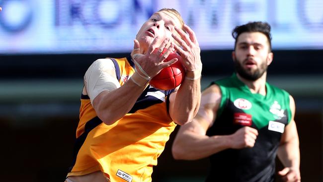 Strathmore’s Jack Harris takes possession on Saturday. Picture: Mark Dadswell