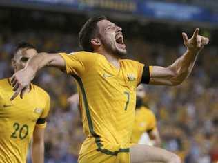 Australia's Mathew Leckie, center, celebrates scoring against the United Arab Emirates during their world Cup qualifying soccer match in Sydney, Tuesday, March 28, 2017. (AP Photo/Rick Rycroft). Picture: Rick Rycroft