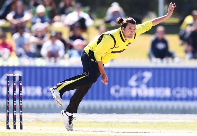 Usman Qadir on his way to 3/50 against Victoria in the JLT Cup.