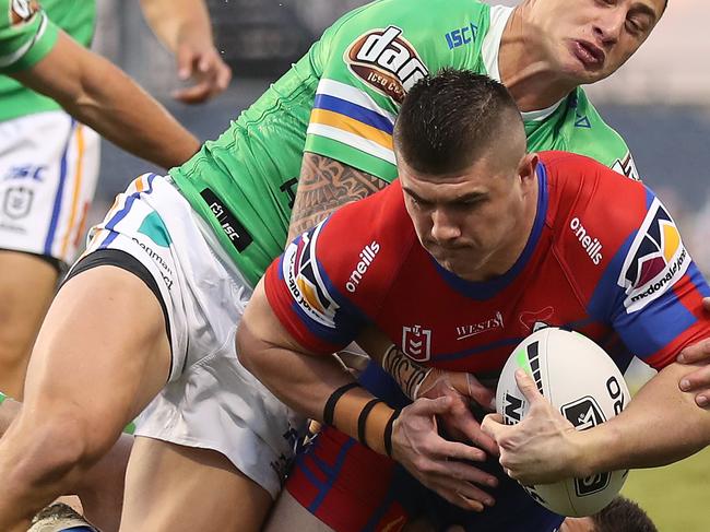 SYDNEY, AUSTRALIA - JUNE 07: Bradman Best of the Knights scores a try during the round four NRL match between the Canberra Raiders and the Newcastle Knights at Campbelltown Stadium on June 07, 2020 in Sydney, Australia. (Photo by Mark Kolbe/Getty Images)