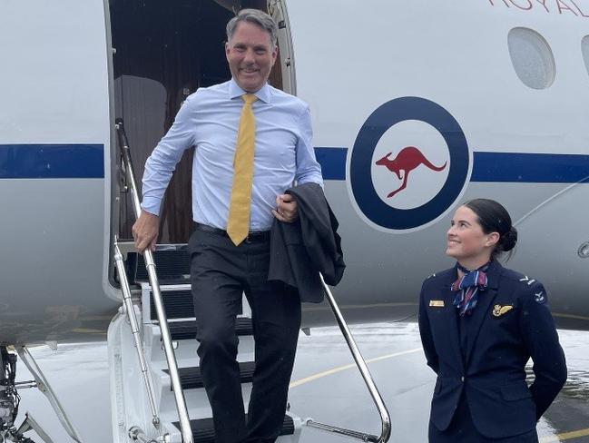 Richard Marles disembarking from a VIP flight.
