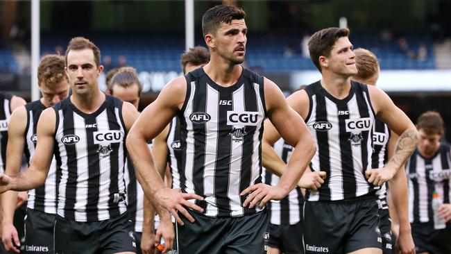 Scott Pendlebury leads his team off after the loss to Carlton. Picture: George Salpigtidis