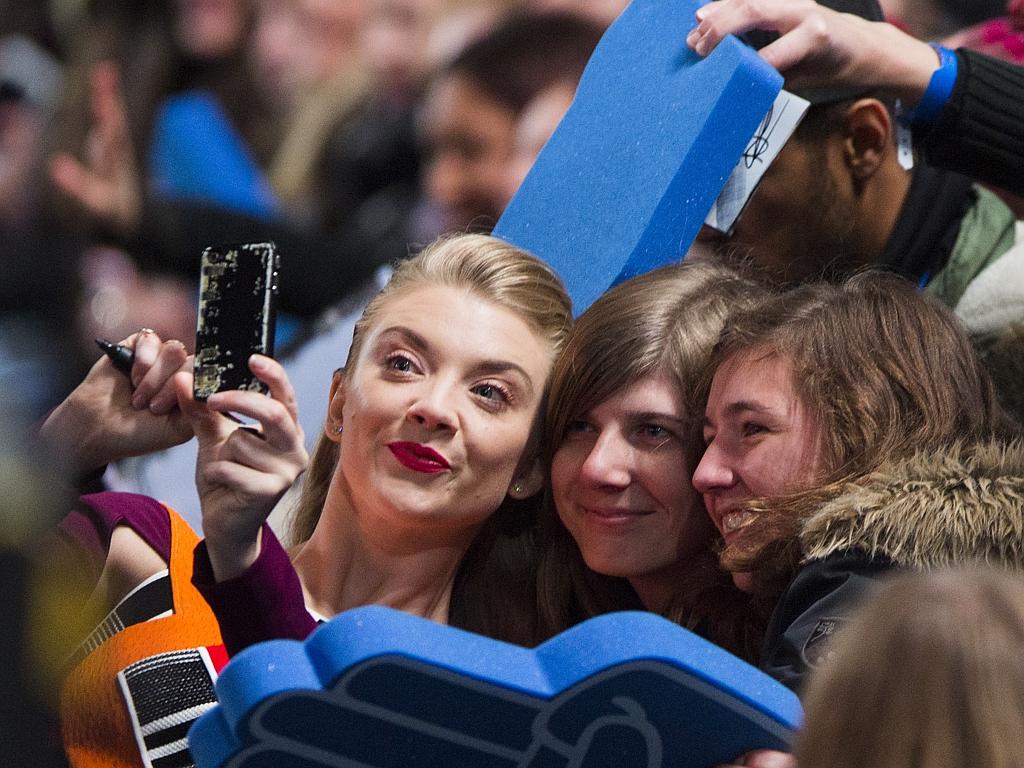 Actress Natalie Dormer poses with fans as she arrives at the world premiere of the film ‘The Hunger Games: Mockingjay - Part 2’ on November 4, 2015 in Berlin. Picture: AP