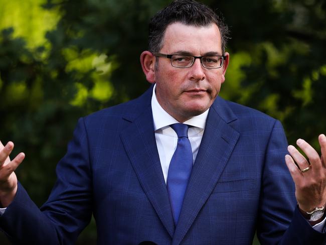 MELBOURNE, AUSTRALIA - FEBRUARY 04: Premier of Victoria Daniel Andrews speaks and makes a gesture during a Press conference at Victorian Parliament House on February 04, 2021 in Melbourne, Australia. Victoria has reintroduced COVID-19 restrictions after a hotel quarantine worker tested positive for coronavirus on Wednesday. The positive case was from one of the Australian Open quarantine hotels, with some 600 Australian Open players, officials and support staff told to isolate and get tested. All tennis matches at Melbourne Park on Thursday have been called off. Masks are now mandatory indoors across Victoria with gatherings now limited to 15 people in a household while the 75 percent return to work plan, scheduled to begin on Monda has been paused. (Photo by Asanka Ratnayake/Getty Images) *** BESTPIX ***