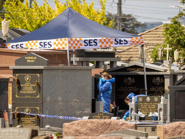 Forensic police examining Footscray General Cemetery. Picture: Jason Edwards