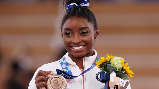 Simone Biles of Team United States poses with the bronze medal. Picture: Jamie Squire/Getty Images