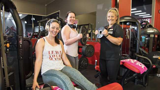 Discussing fitness new year resolutions at World Gym Toowoomba are (from left) Mikaela Ryan, Paige Howes and club manager Kayla Ferguson, Tuesday, December 31, 2019. Picture: Kevin Farmer