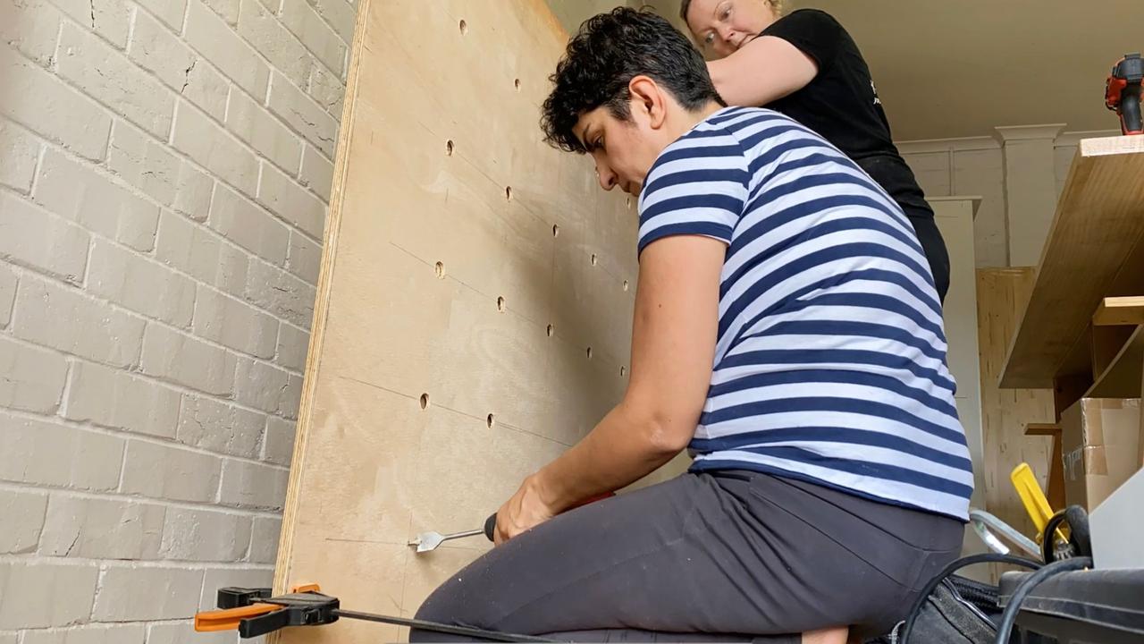 The women in action. They used $1500 worth of products and materials from Bunnings, including plywood ($65), Taubmans 3 in 1 prep ($66.80) and Taubmans wall paint ($129.50). Picture: Supplied