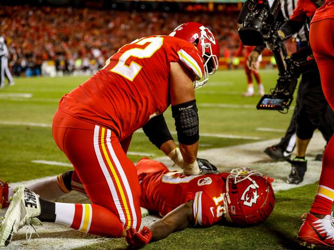 Eric Fisher #72 of the Kansas City Chiefs pretends to provide CPR to teammate Tyreek Hill #10 as a touchdown celebration. Picture: Getty Images