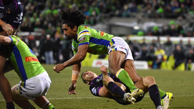 Sia Soliola takes out Billy Slater.