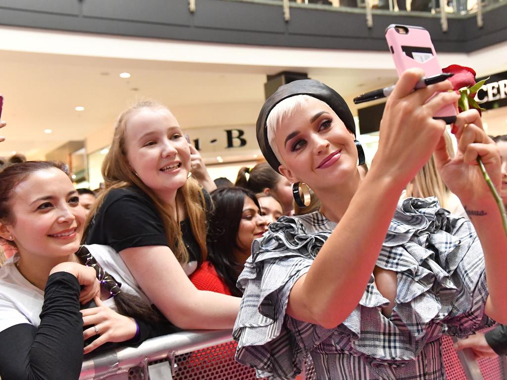 Katy Perry photographed at Westfield Marion, Adelaide on Sunday the 29th of July 2018. Erin Hull - 15yrs (Marion) with Katy Perry (AAP/ Keryn Stevens)