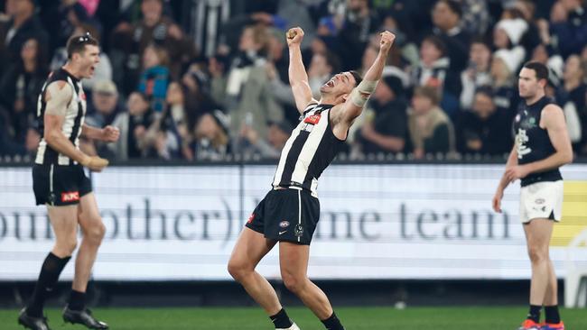 MELBOURNE, AUSTRALIA - AUG 03: Scott Pendlebury of the Magpies celebrates as the final siren sounds during the 2024 AFL Round 21 match between the Collingwood Magpies and the Carlton Blues at The Melbourne Cricket Ground on August 03, 2024 in Melbourne, Australia. (Photo by Michael Willson/AFL Photos via Getty Images)