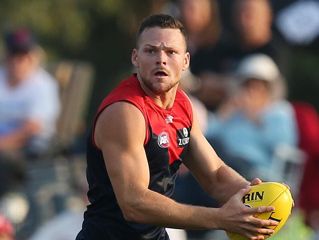 Melbourne v Brisbane Lions at Casey Fields, Cranbourne. 09/03/2019 .    Melbourne's Steven May cleans up down in defence   . Pic: Michael Klein