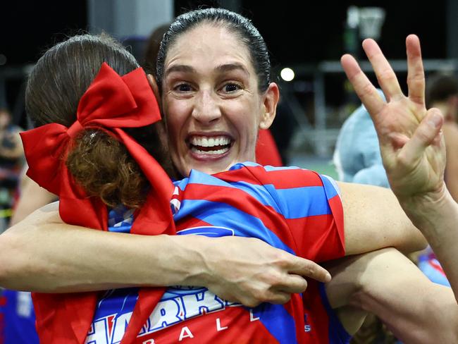 WGC Sharks veteran Amanda Barton celebrates winning her third straight Cairns Netball premiership in the Cairns Netball Division 1 grand final match between the WGC Sharks and the Cairns Leprechauns. Picture: Brendan Radke