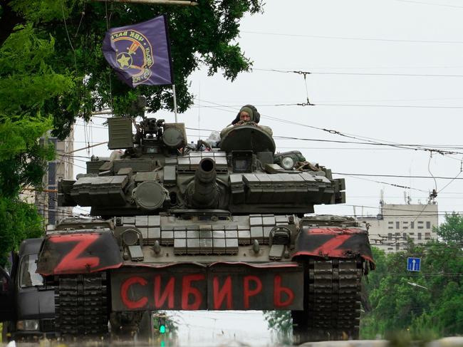 Members of Wagner group sit atop of a tank in a street in the city of Rostov-on-Don, on June 24. Picture: AFP