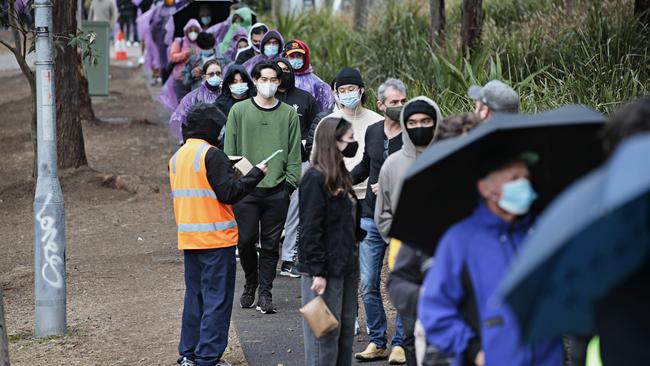The line-up on Sunday morning at the Homebush vaccination centre. Picture: Adam Yip