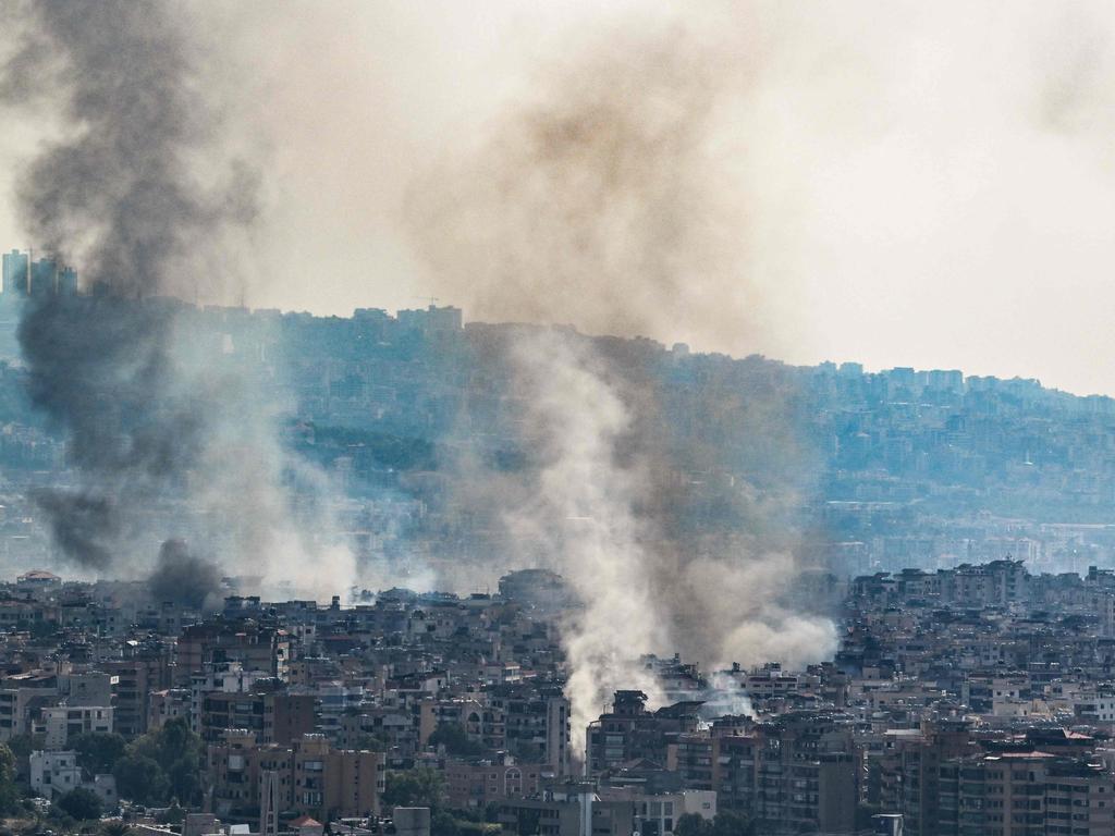 Smoke rises over Beirut's southern suburbs during Israeli strikes on September 28, 2024. Picture: AFP.