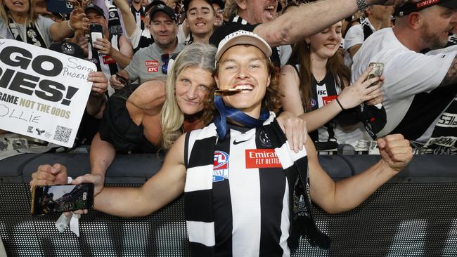 MELBOURNE, AUSTRALIA - SEPTEMBER 30: Jack Ginnivan of the Magpies poses with his Premiership Medal after the 2023 AFL Grand Final match between Collingwood Magpies and Brisbane Lions at Melbourne Cricket Ground, on September 30, 2023, in Melbourne, Australia. (Photo by Darrian Traynor/AFL Photos/via Getty Images)